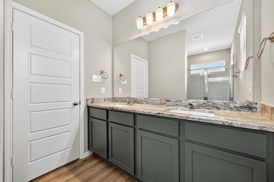 Furnished interior view inside a new home in Sunterra, Katy (Image 9).