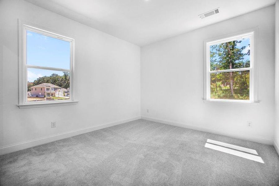 Spacious, unfurnished interior of a new home in Bailey Fence, Dacula (Image 17).