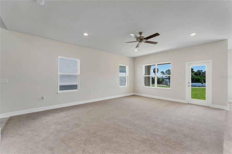 Representative unfurnished interior of a home built from the 2202- by Adams Homes in Winding Oaks, Weeki Wachee (Image 10).