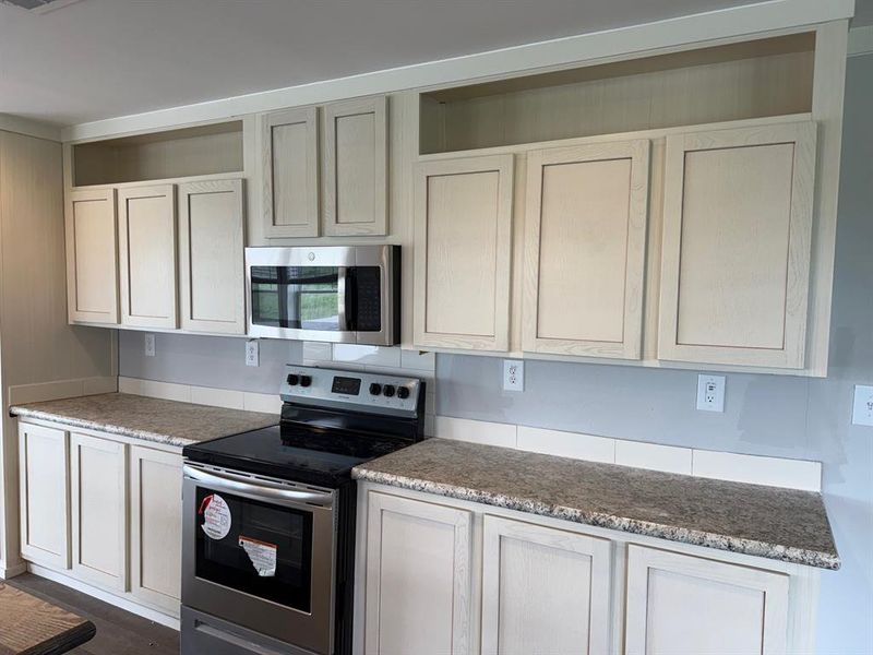 Furnished interior view inside a new home in , Joshua (Image 8).