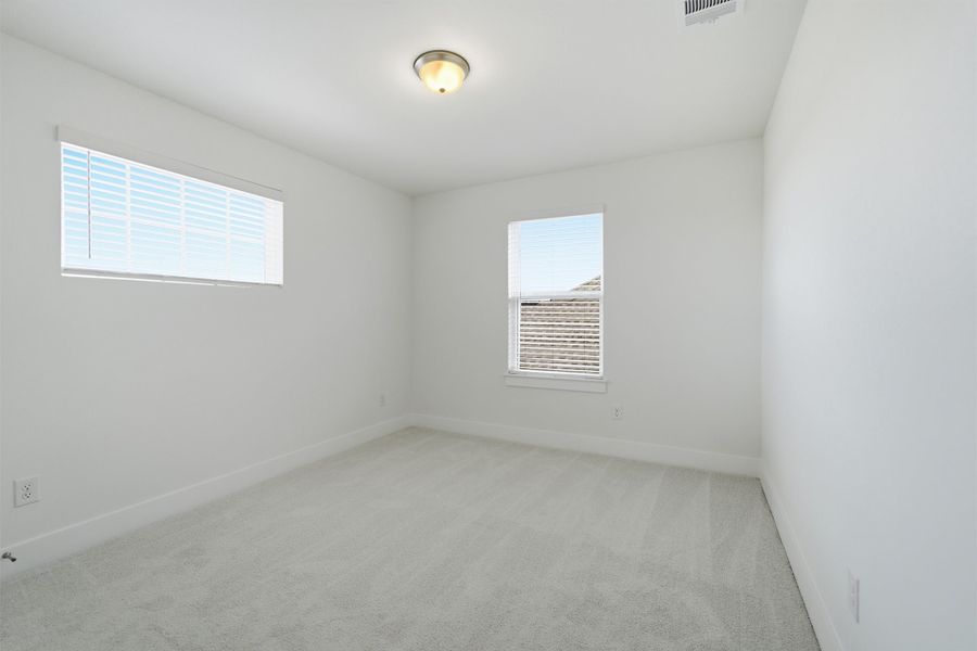Spacious, unfurnished interior of a new home in Santa Rita Ranch, Liberty Hill (Image 60).