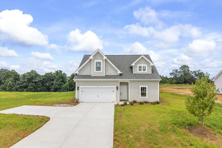 Front exterior of a new home in , Toccoa, GA, highlighting curb appeal (Image 1). Front exterior of a new home in , Toccoa, GA, highlighting curb appeal (Image 1).