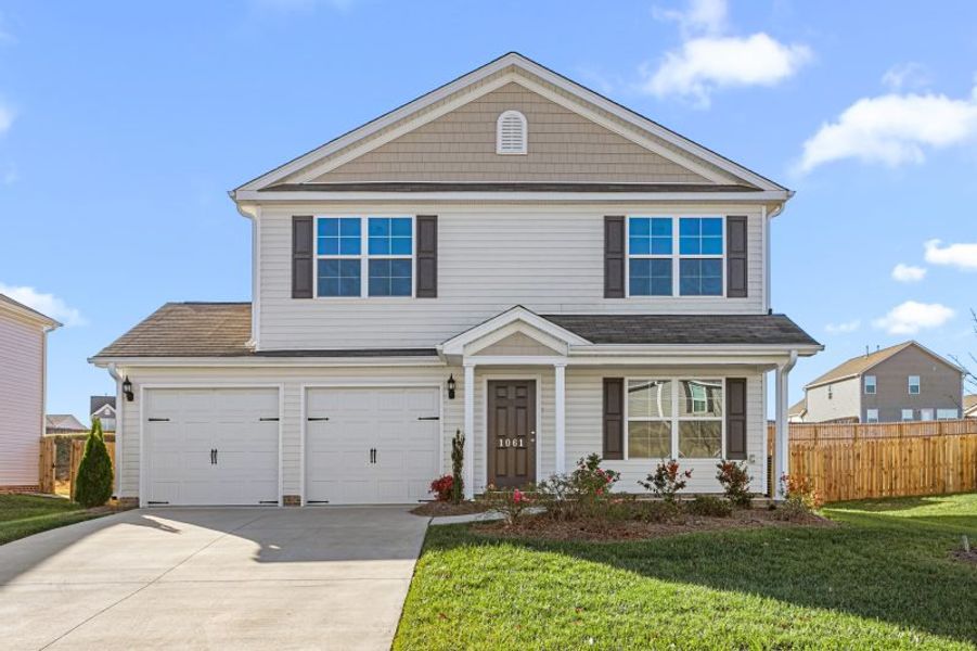 Representative exterior photo of a completed home built from the Dayton by Keystone Homes NC in Brassfield Meadows, Burlington, NC (Image 39). Representative exterior photo of a completed home built from the Dayton by Keystone Homes NC in Brassfield Meadows, Burlington, NC (Image 39).