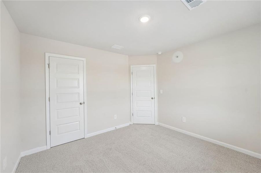 Spacious, unfurnished interior of a new home in Hemingway - Highland Series, Cumming (Image 46).