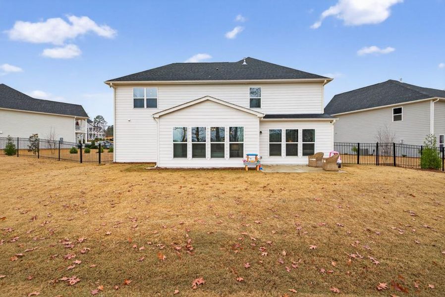 Exterior details and patio area of a home in Reunion, Flowery Branch (Image 30). Exterior details and patio area of a home in Reunion, Flowery Branch (Image 30).