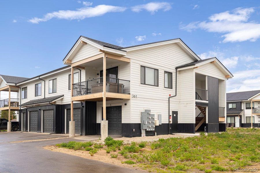 Front exterior of a new home in , Fraser, CO, highlighting curb appeal (Image 18).