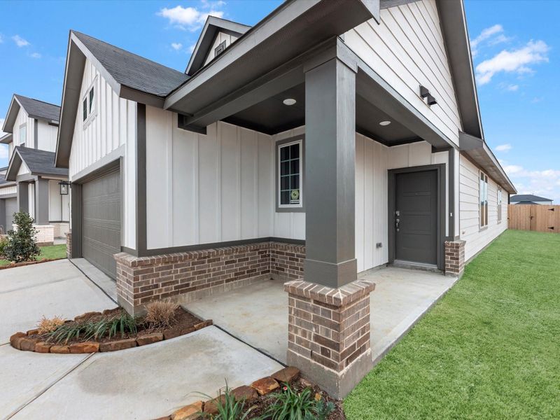 Exterior details and patio area of a home in Mason Woods, Cypress (Image 15). Exterior details and patio area of a home in Mason Woods, Cypress (Image 15).