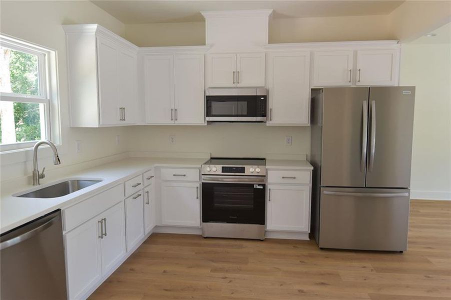 Furnished interior view inside a new home in , Watkinsville (Image 6). Furnished interior view inside a new home in , Watkinsville (Image 6).