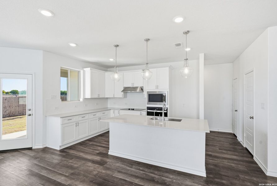 Furnished interior view inside a new home in Nopal Valley, San Antonio (Image 7).