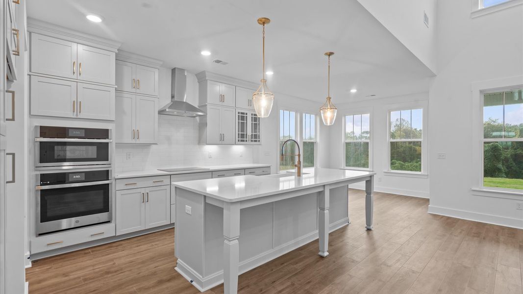 Notable 9-foot island provides generous prep and gathering space in this thoughtfully designed kitchen