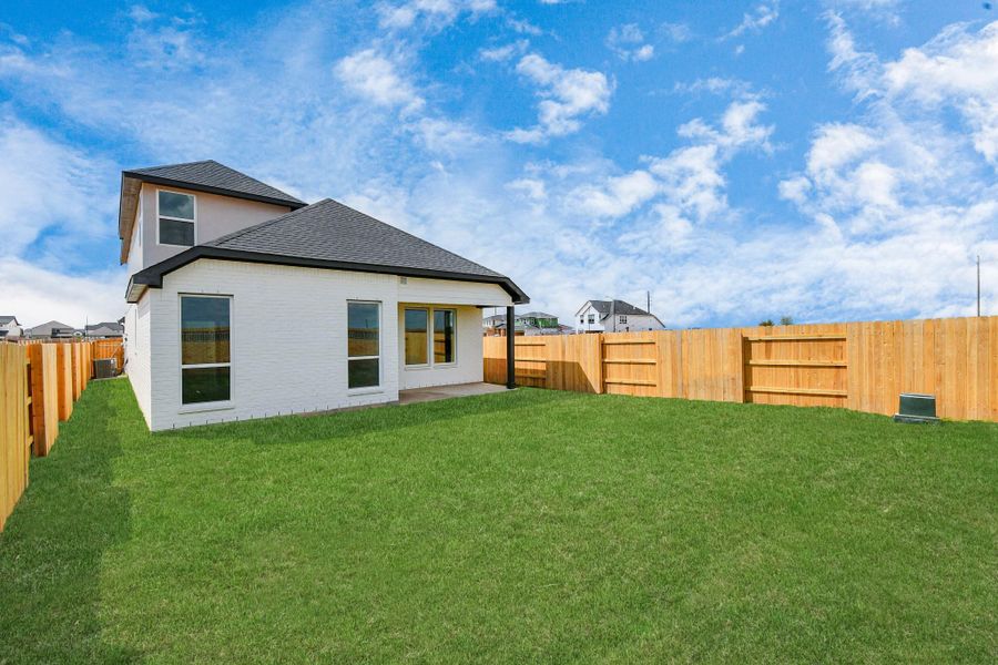 Exterior details and patio area of a home in Elyson, Katy (Image 23).