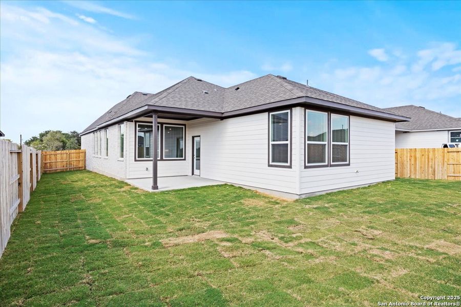 Exterior details and patio area of a home in Village at Three Oaks, Seguin (Image 3). Exterior details and patio area of a home in Village at Three Oaks, Seguin (Image 3).