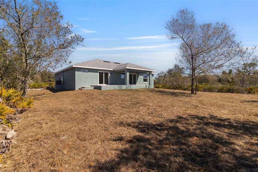 Exterior details and patio area of a home in , Port Charlotte (Image 19).