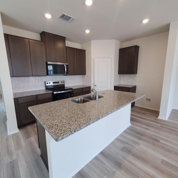 Furnished interior view inside a new home in Sonterra - Cool Water, Jarrell (Image 11).