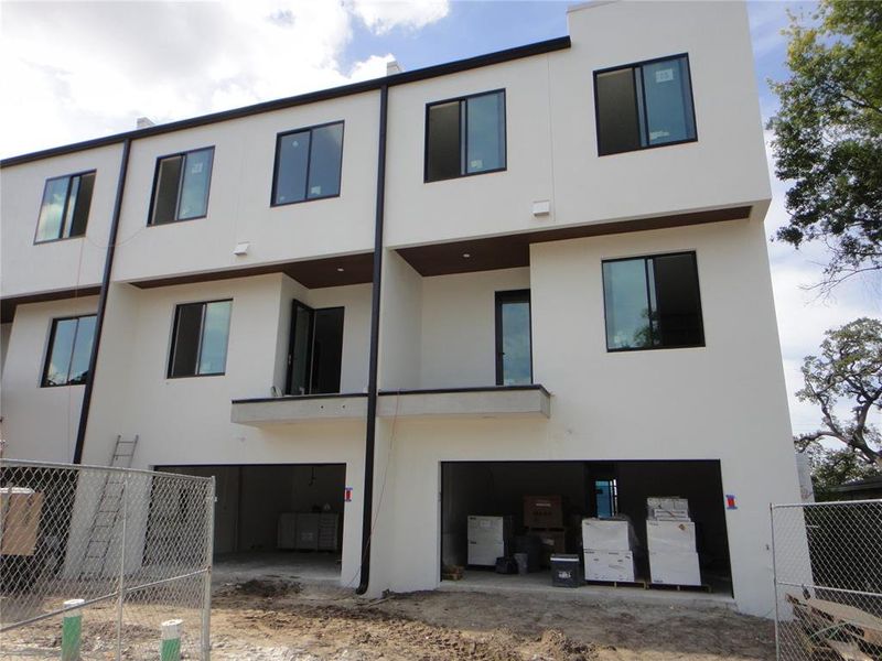 Front exterior of a new home in , Tampa, FL, highlighting curb appeal (Image 1).