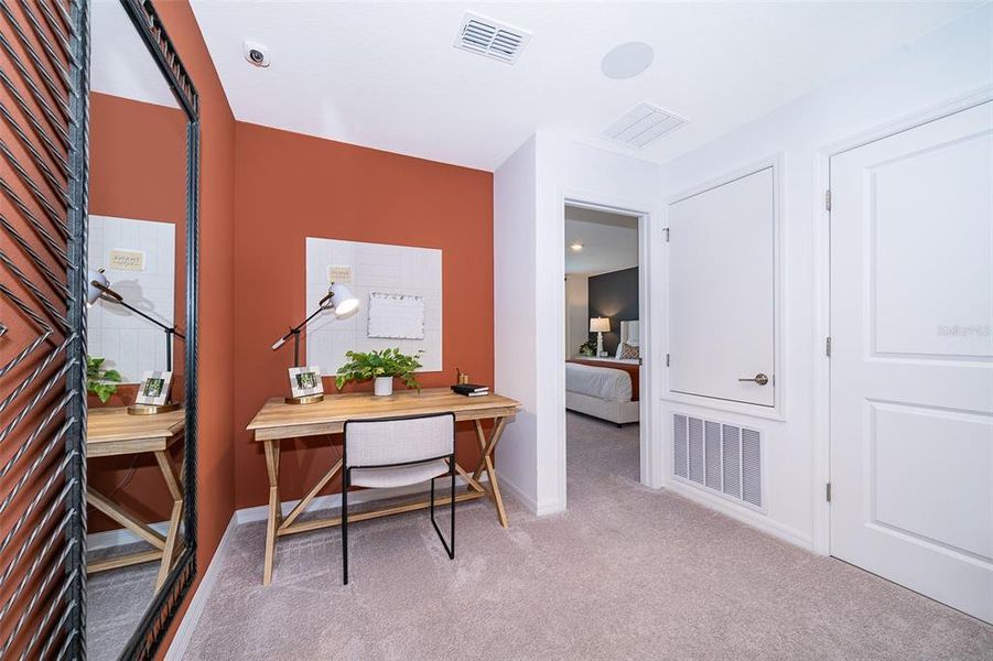 Furnished interior view inside a new home in Horse Creek at Crosswinds, Davenport (Image 7).