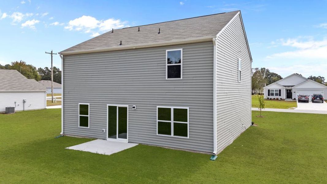 Exterior details and patio area of a home in Madeline Farm, New Bern (Image 4).