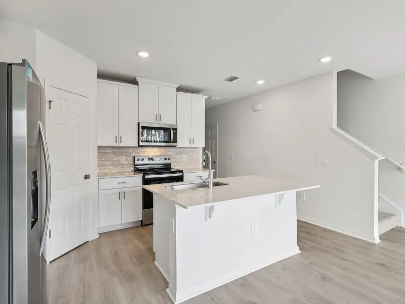 Furnished interior view inside a new home in Cagan Crossings West, Clermont (Image 3).