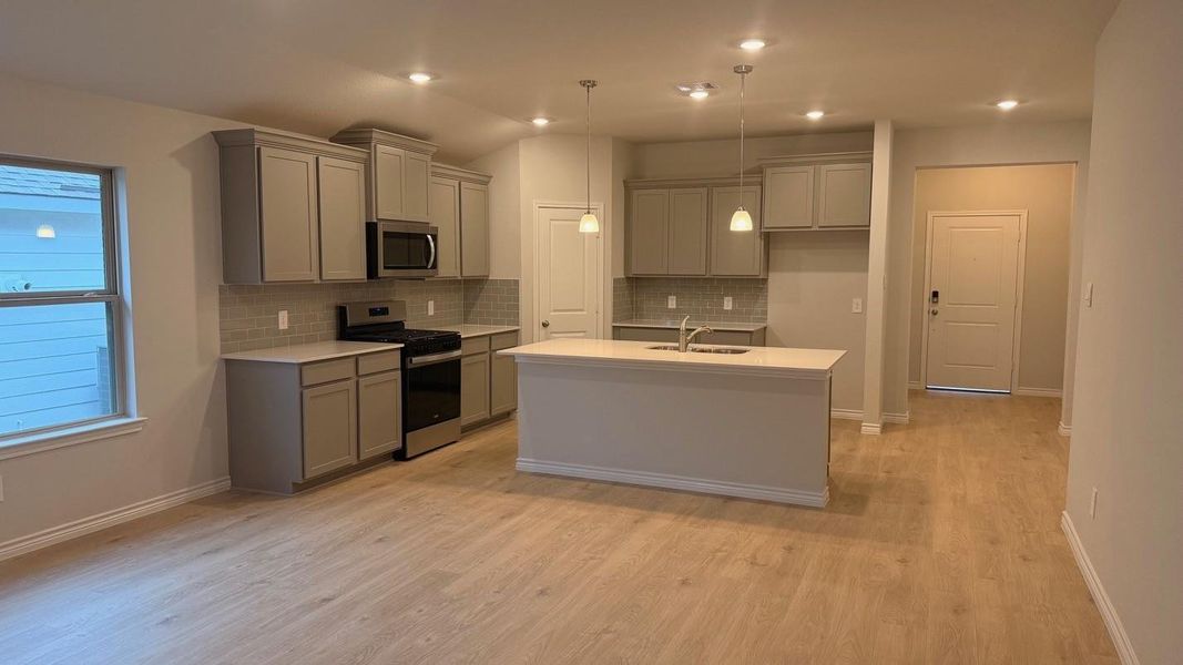 Furnished interior view inside a new home in Southern Pointe, College Station (Image 3). Furnished interior view inside a new home in Southern Pointe, College Station (Image 3).