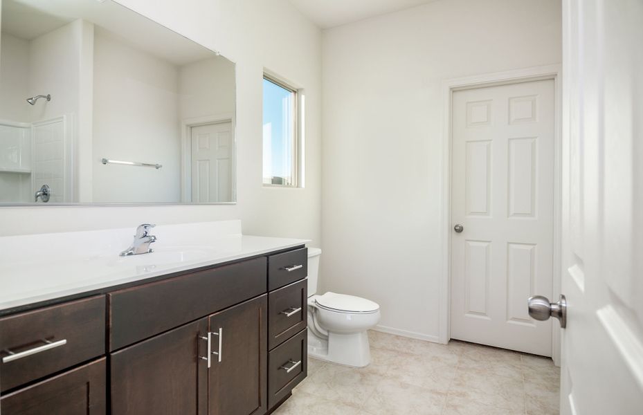 Representative furnished interior of a home built from the Lavender by Centex in Entrada La Coraza at Rancho Sahuarita, Sahuarita (Image 11).