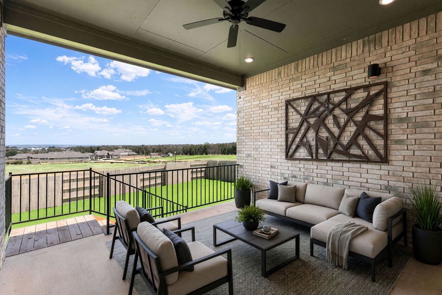 Exterior details and patio area of a home in The Colony, Bastrop (Image 3).
