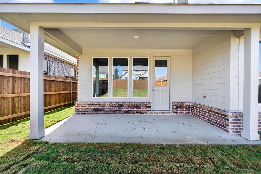 Exterior details and patio area of a home in Liberty Pointe, Gainesville (Image 24).