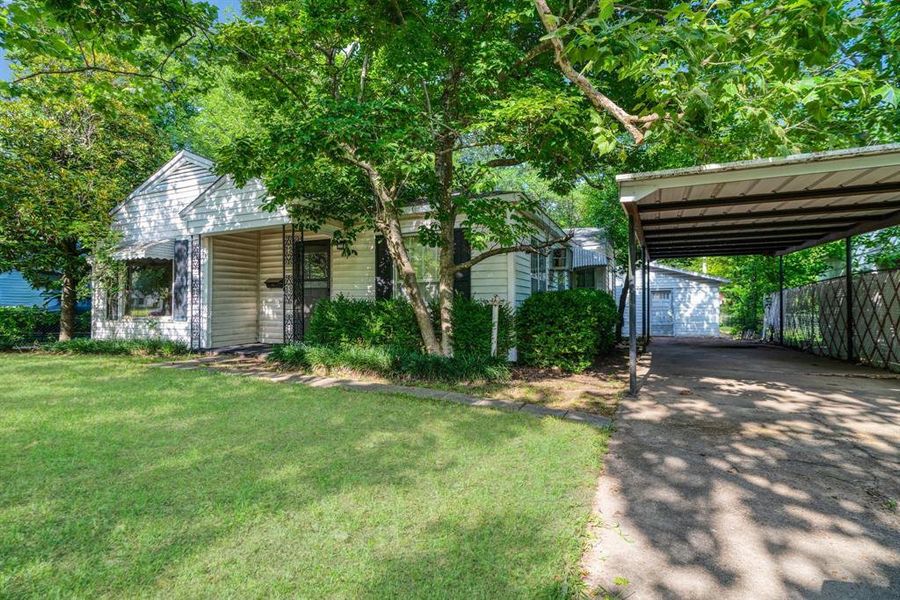 Front exterior of a new home in , Paris, TX, highlighting curb appeal (Image 12). Front exterior of a new home in , Paris, TX, highlighting curb appeal (Image 12).