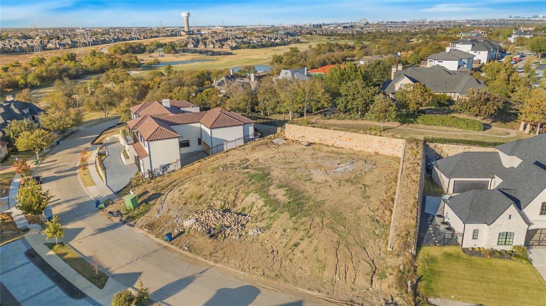 Aerial overview of property's location featuring nearby suburban area