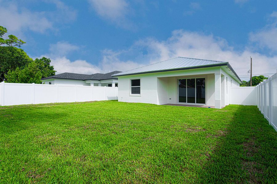Front exterior of a new home in , Jupiter, FL, highlighting curb appeal (Image 2).