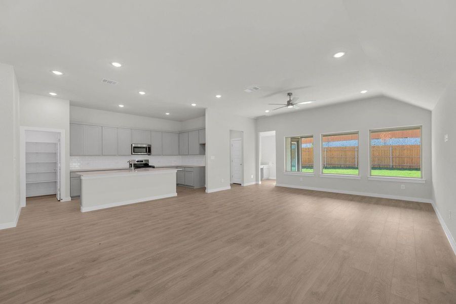 Kitchen in the Pecos home plan by Trophy Signature Homes – REPRESENTATIVE PHOTO
