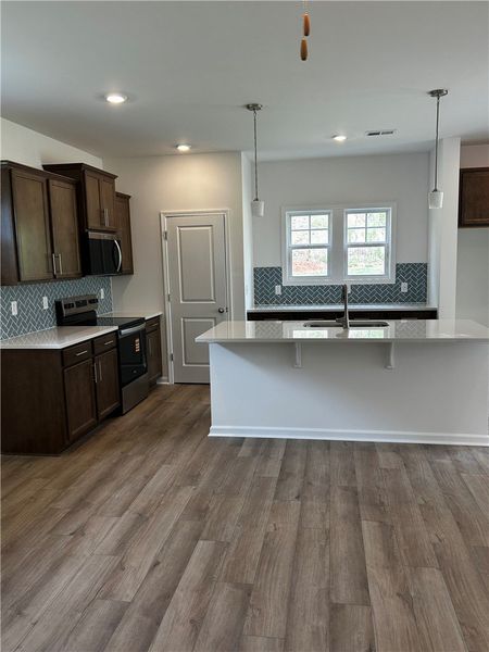 Furnished interior view inside a new home in Brownstone Park, Easley (Image 7).