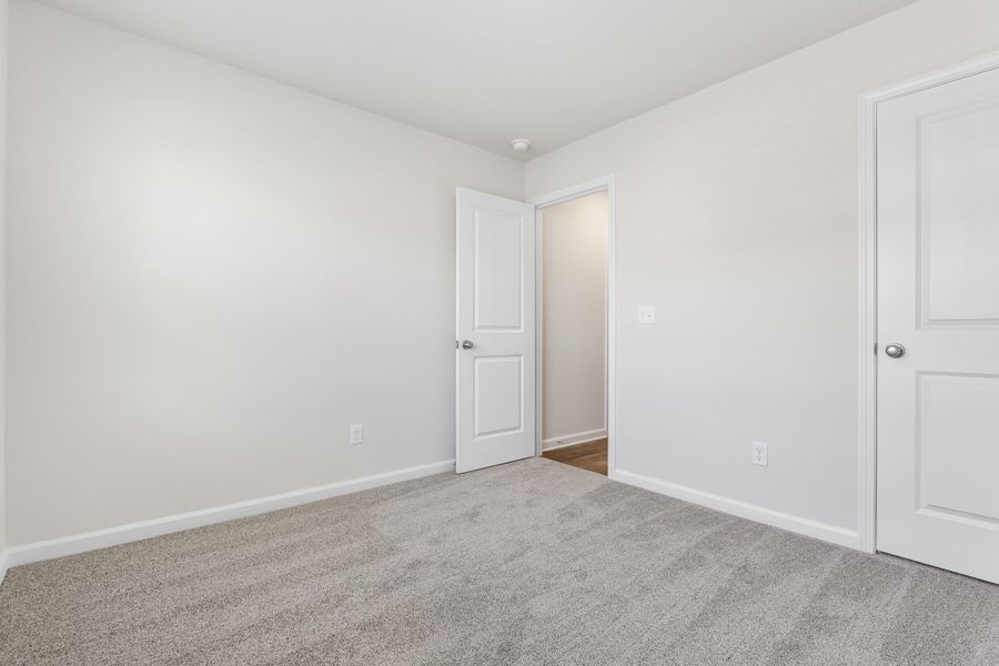 Representative unfurnished interior of a home built from the Juniper B by McGuinn Homes in South Welcome, Greenville (Image 31). Representative unfurnished interior of a home built from the Juniper B by McGuinn Homes in South Welcome, Greenville (Image 31).