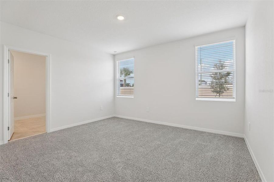 Spacious, unfurnished interior of a new home in Lawson Dunes - Signature Series, Haines City (Image 22).