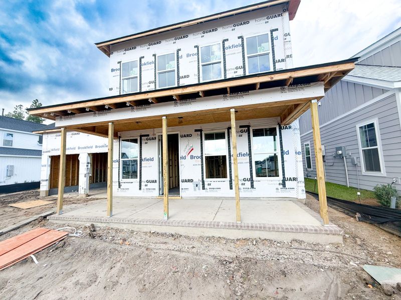 Front exterior of a new home in Nexton, Summerville, SC, highlighting curb appeal (Image 1). Front exterior of a new home in Nexton, Summerville, SC, highlighting curb appeal (Image 1).