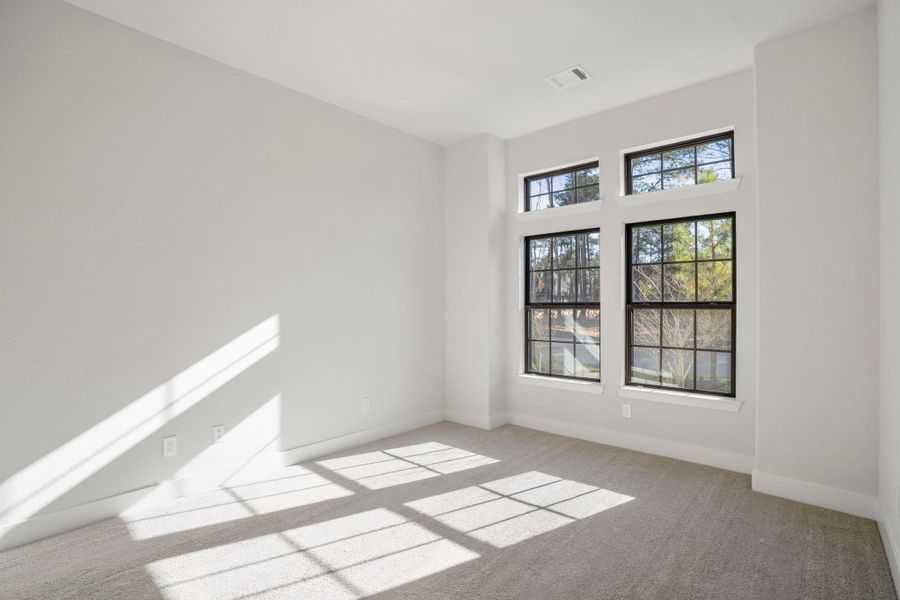 Spacious, unfurnished interior of a new home in The Woodlands Hills, Willis (Image 29).