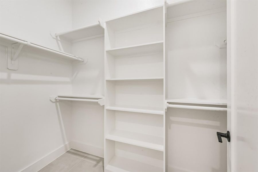The primary closet is already equipped with a storage system.