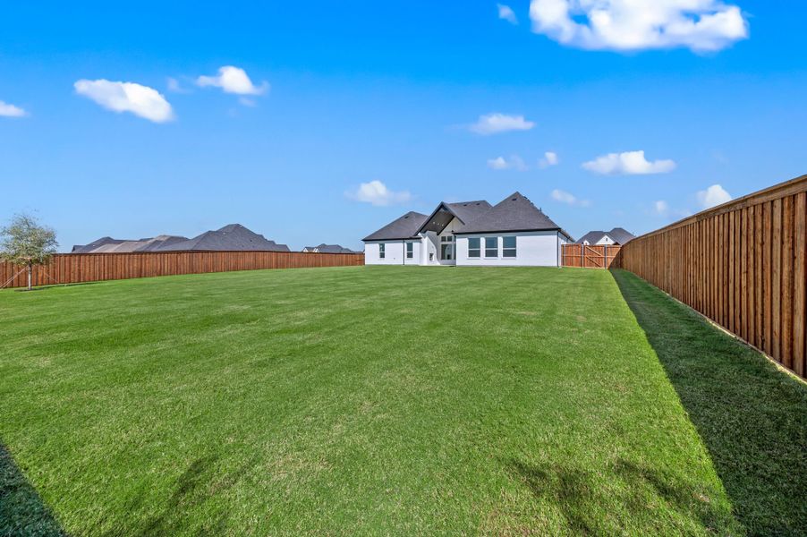 Exterior details and patio area of a home in NorthGlen, Haslet (Image 32).