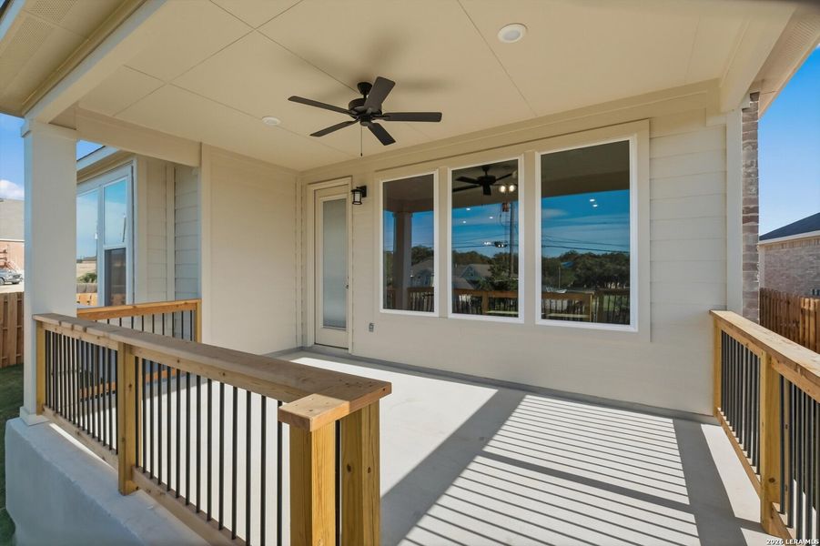 Exterior details and patio area of a home in Windsong, Boerne (Image 3).