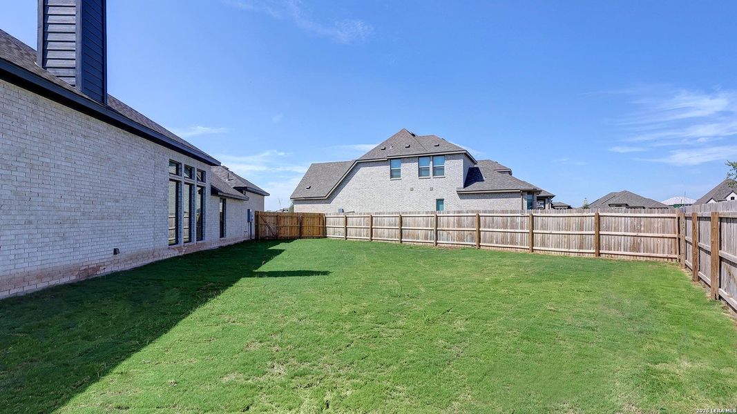Exterior details and patio area of a home in Alsatian Oaks, Castroville (Image 24).