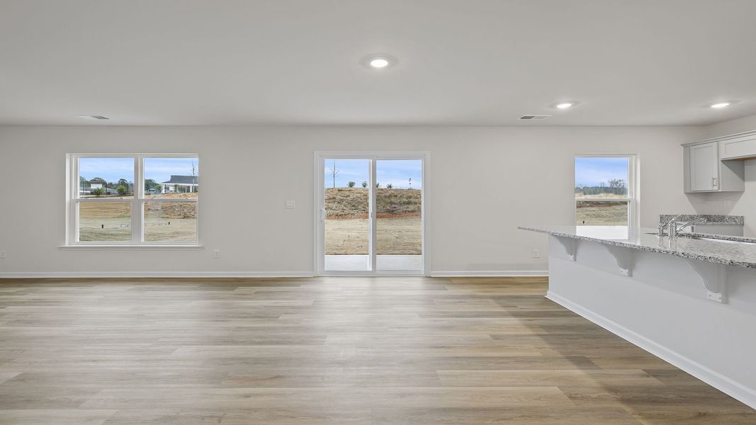 Spacious, unfurnished interior of a new home in Bentley Park, Greenwood (Image 16).