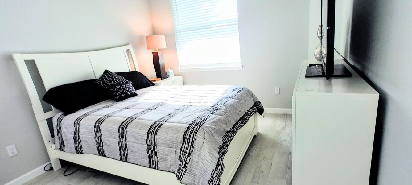 Furnished interior view inside a new home in Del Webb Tradition, Port St. Lucie (Image 7).