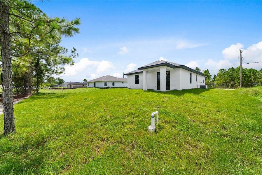 Exterior details and patio area of a home in , Lehigh Acres (Image 18).