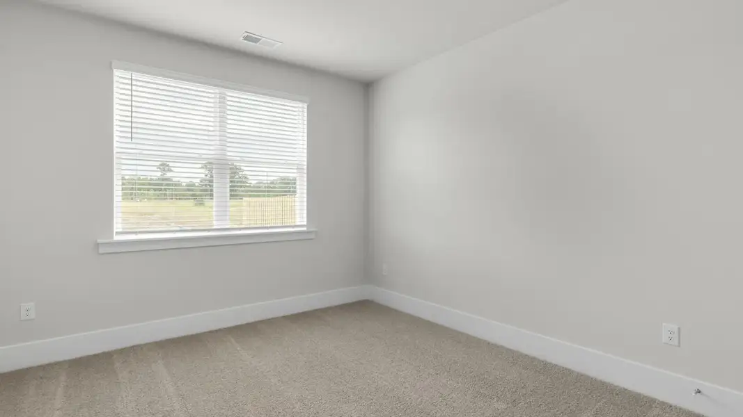 Spacious, unfurnished interior of a new home in The Highlands at Cedar Hill Landing, Navassa (Image 20).