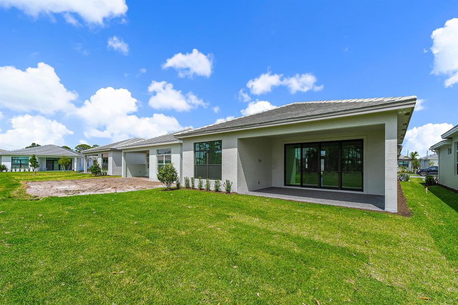 Exterior details and patio area of a home in Cove Royale, Stuart (Image 2).