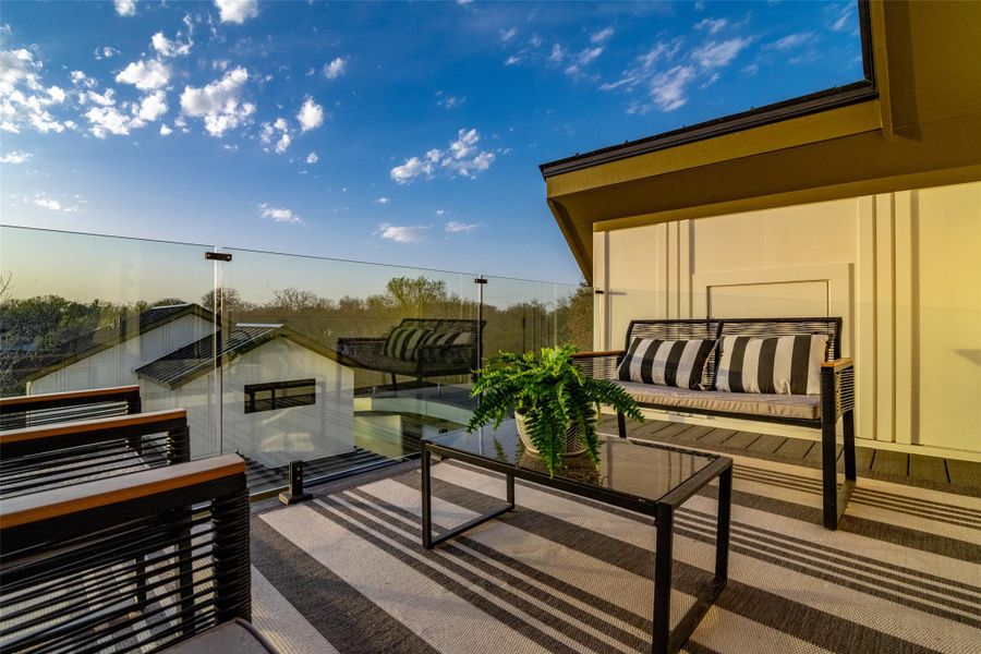 Balcony featuring an outdoor hangout area and a patio