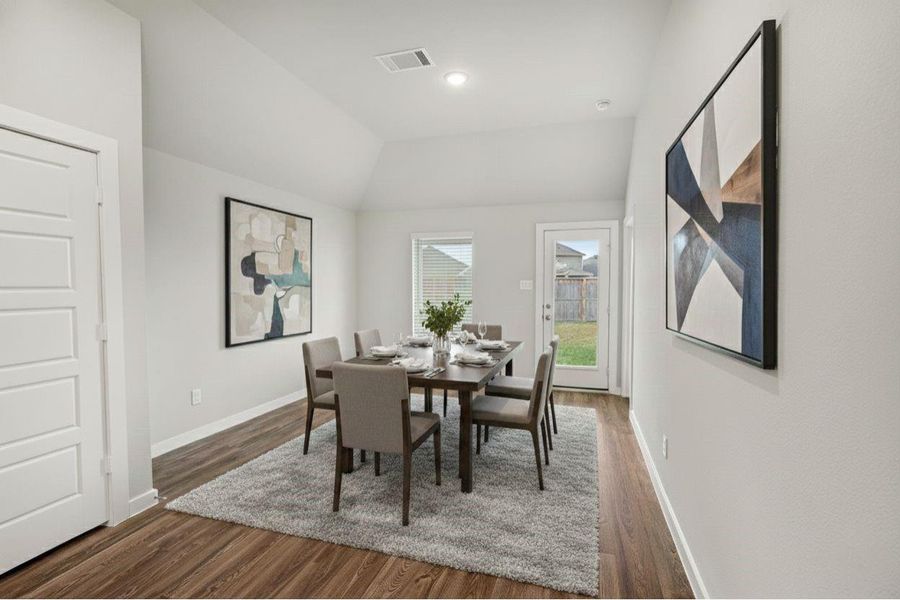 Elegant formal dining room with views of the backyard. (Virtually Staged) Elegant formal dining room with views of the backyard. (Virtually Staged)