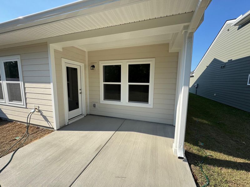 Exterior details and patio area of a home in , Ravenel (Image 3).