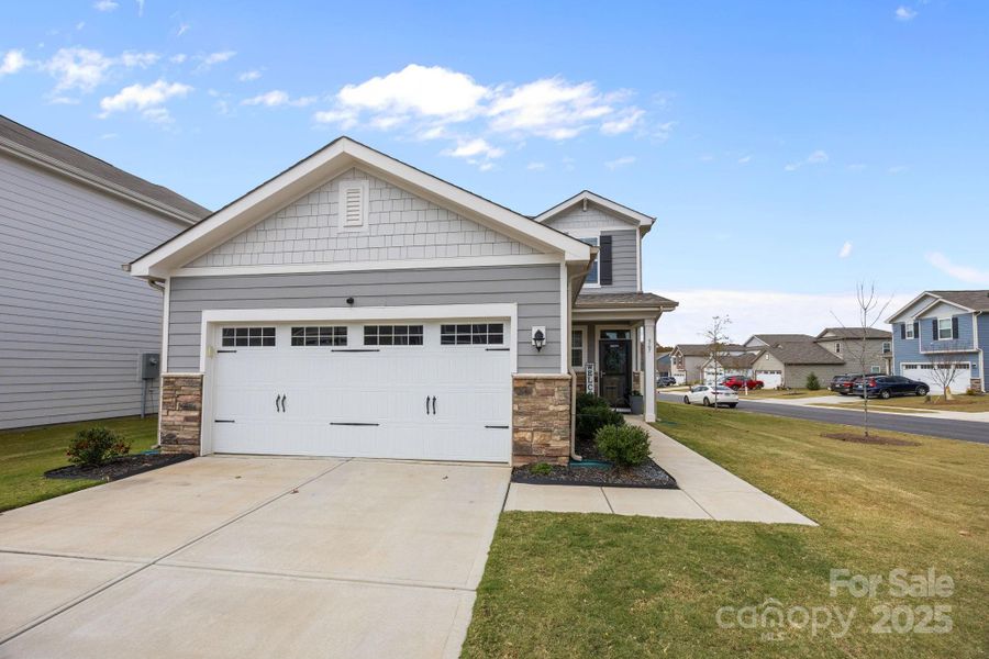 Front exterior of a new home in The Meadows at Asbury Ridge, York, SC, highlighting curb appeal (Image 21). Front exterior of a new home in The Meadows at Asbury Ridge, York, SC, highlighting curb appeal (Image 21).