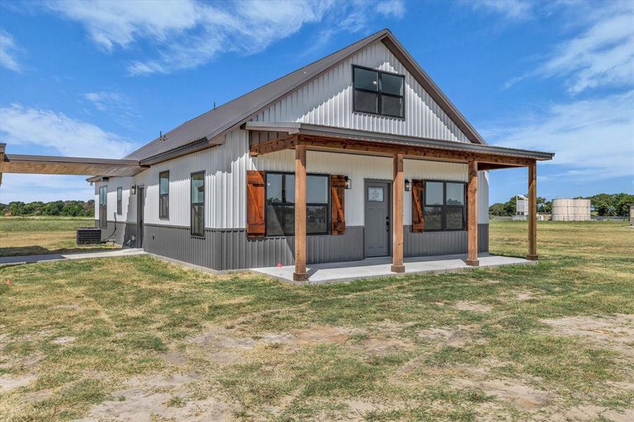 Front exterior of a new home in , Elm Mott, TX, highlighting curb appeal (Image 20). Front exterior of a new home in , Elm Mott, TX, highlighting curb appeal (Image 20).