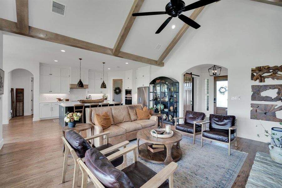 Oversized living room with dramatic beams!